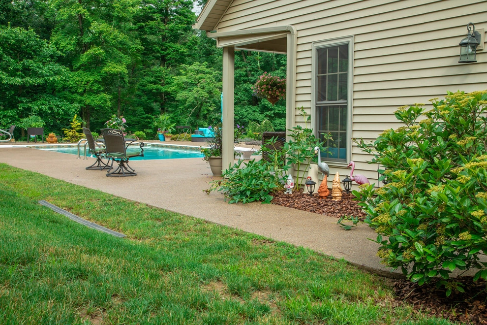 Poolside Patio by Winland's Complete Landscaping Service - Photo 9