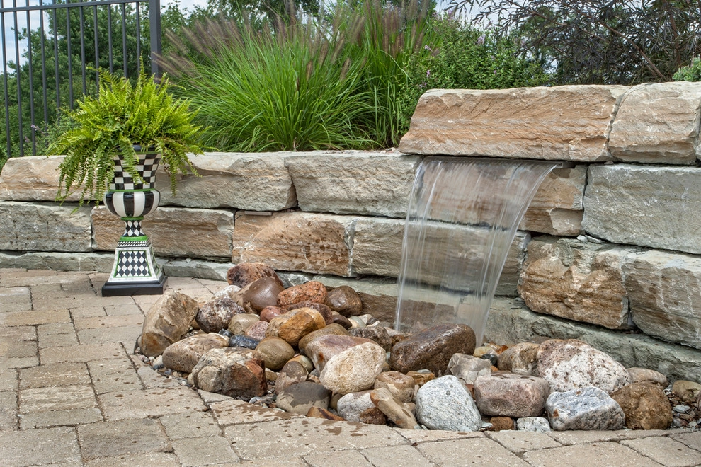 Poolside on a hillside by Winland's Complete Landscaping Service - Photo 3