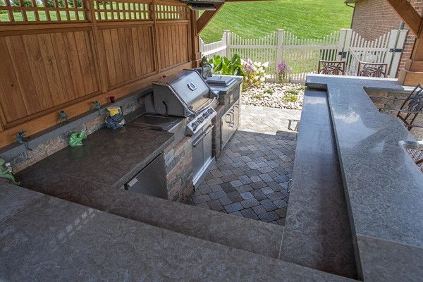 Outdoor Kitchen by Winland's Complete Landscaping Service - Photo 9