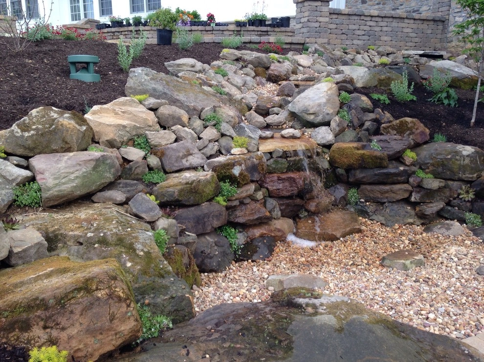 Top rock pondless waterfeature by Winland's Complete Landscaping Service - Photo 3