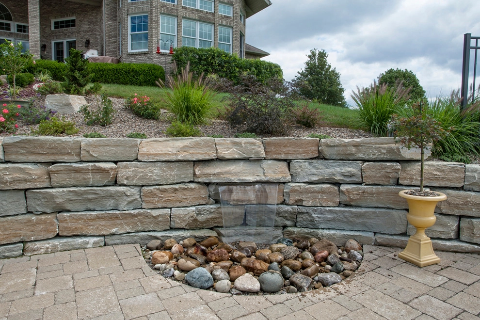 Poolside on a hillside by Winland's Complete Landscaping Service - Photo 2