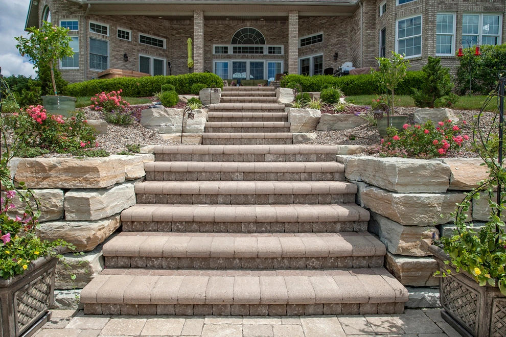 Poolside on a hillside by Winland's Complete Landscaping Service - Photo 5