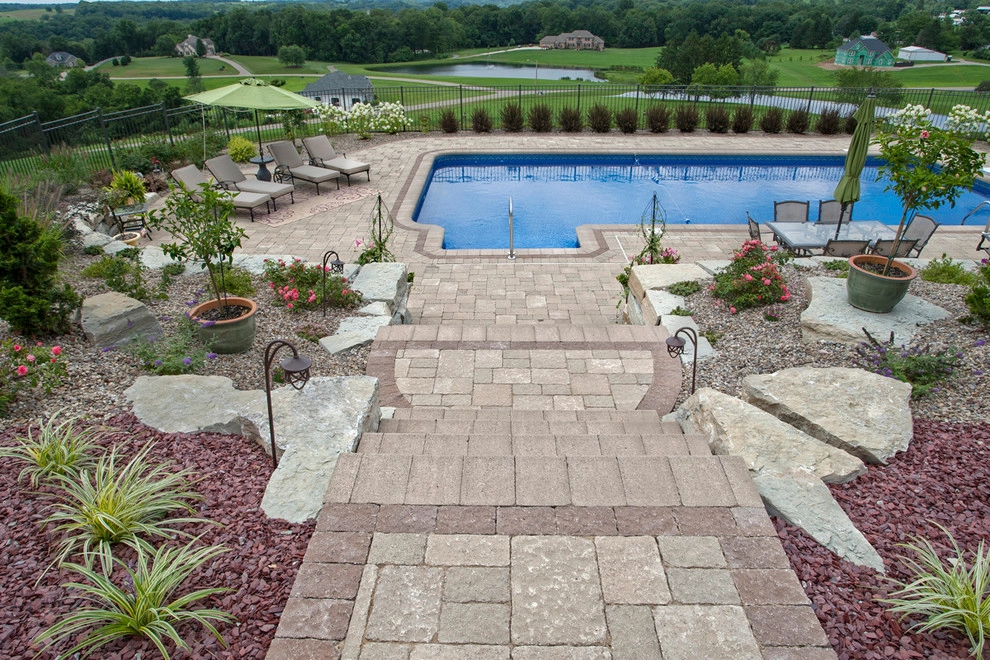 Poolside on a hillside by Winland's Complete Landscaping Service - Photo 4