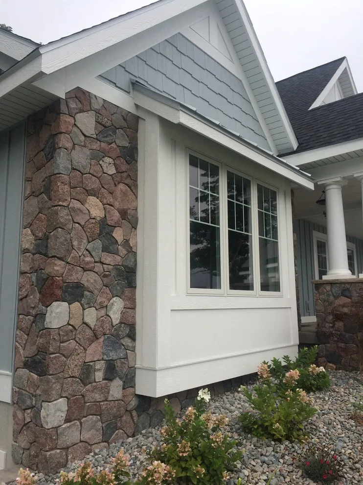 Divided stone house façade by Martell Custom Stone LLC - Photo 8