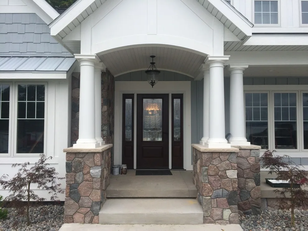 Divided stone house façade by Martell Custom Stone LLC - Photo 7