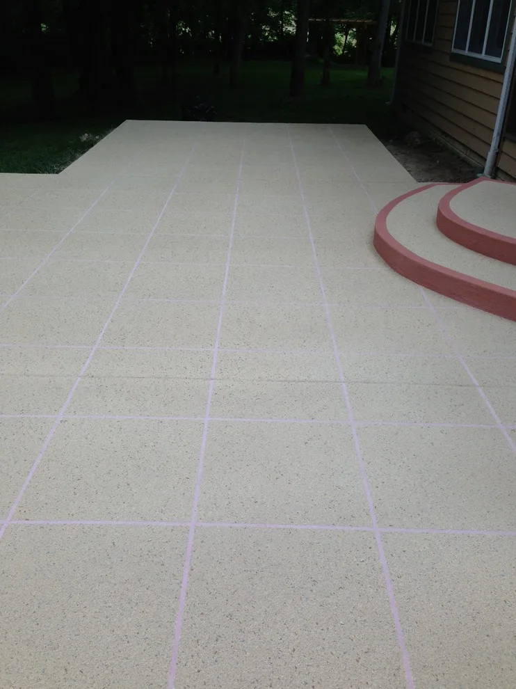 Expansive Paved Tile Design with Spray Finish by Elite Concrete Design - Photo 4