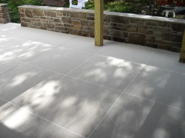 Expansive Paved Tile Design with Spray Finish by Elite Concrete Design - Photo 3