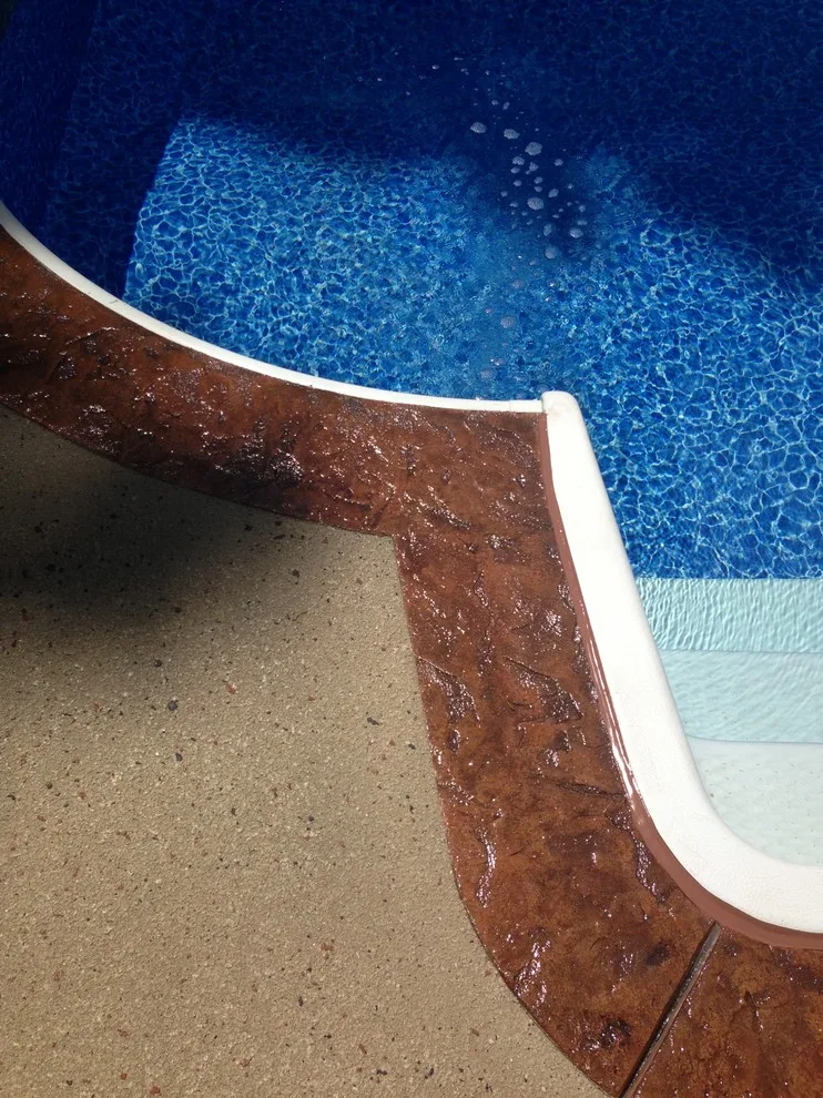 Textured Spray Finish on Stamped Stone Pool Coping and Deck by Elite Concrete Design - Photo 3