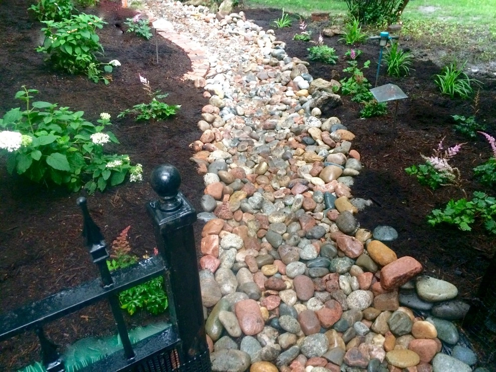 Dry creek bed by Zach's Lawn & Landscaping - Photo 7