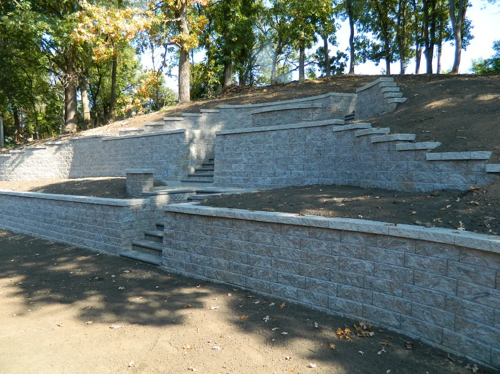 Layered walls and staircases with platforms by Devine Design Hardscapes - Photo 5