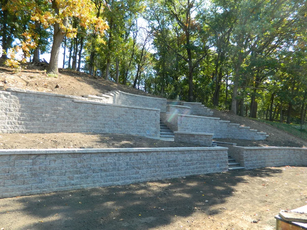 Layered walls and staircases with platforms by Devine Design Hardscapes - Photo 3