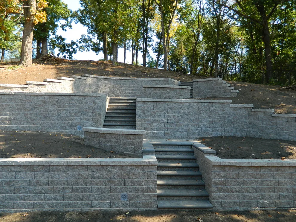 Layered walls and staircases with platforms by Devine Design Hardscapes - Photo 2