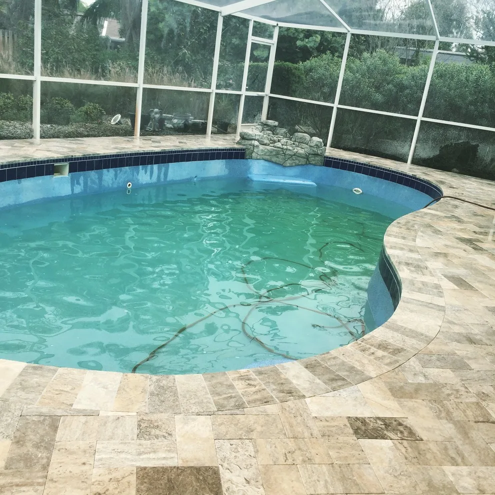 Clearwater Travertine Pool Deck by JR Pavers Inc. - Photo 2