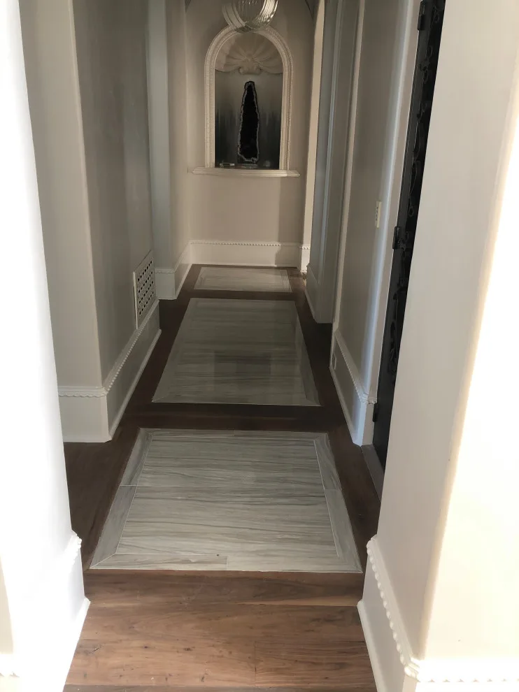 Wood flooring renovation and marble inlays modification by Fine Line Flooring Inc. - Photo 4