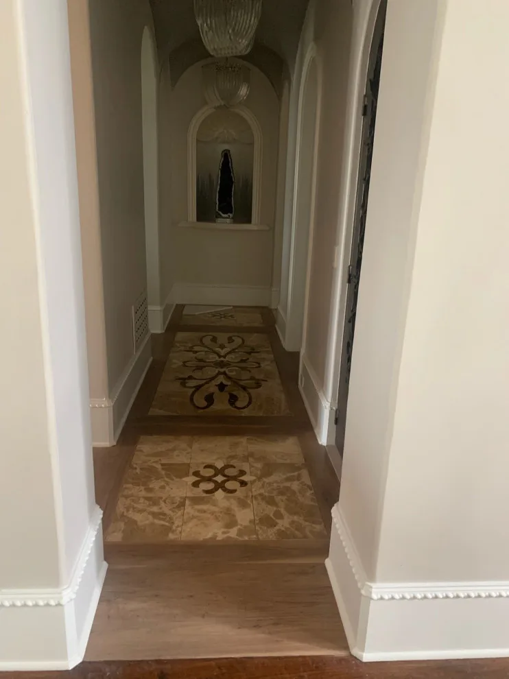 Wood flooring renovation and marble inlays modification by Fine Line Flooring Inc. - Photo 7