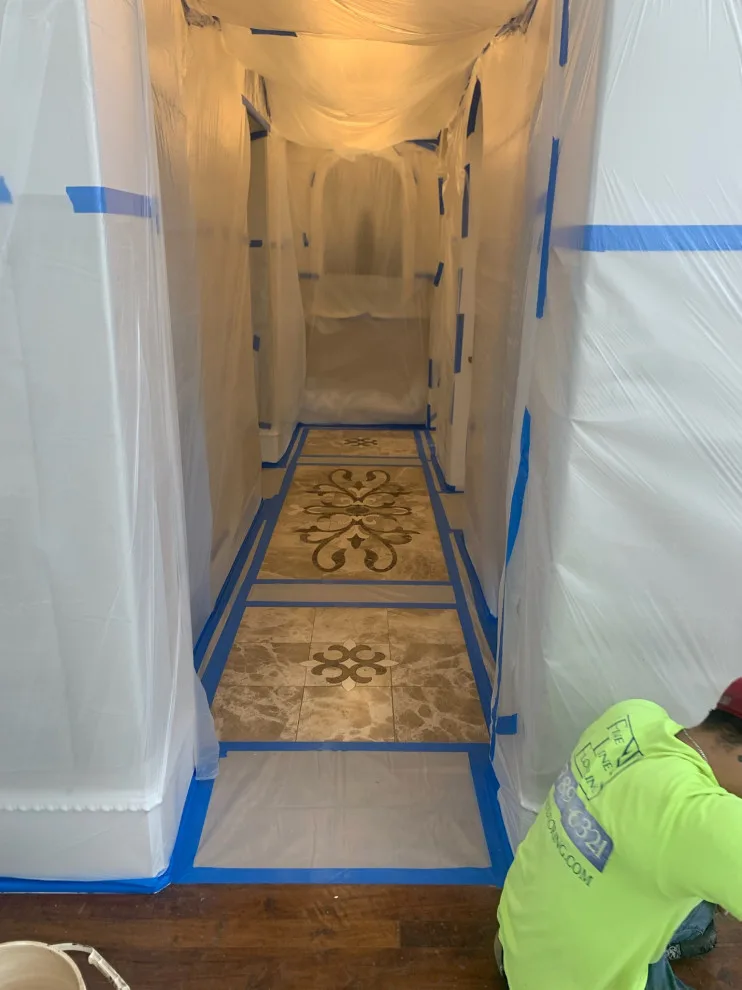 Wood flooring renovation and marble inlays modification by Fine Line Flooring Inc. - Photo 2