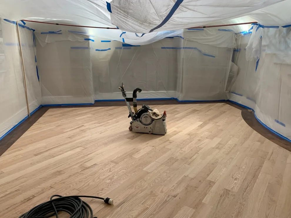 Wood flooring renovation and marble inlays modification by Fine Line Flooring Inc. - Photo 10