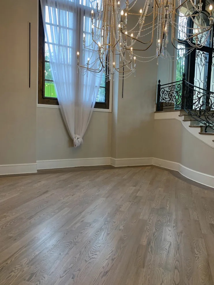 Wood flooring renovation and marble inlays modification by Fine Line Flooring Inc. - Photo 9