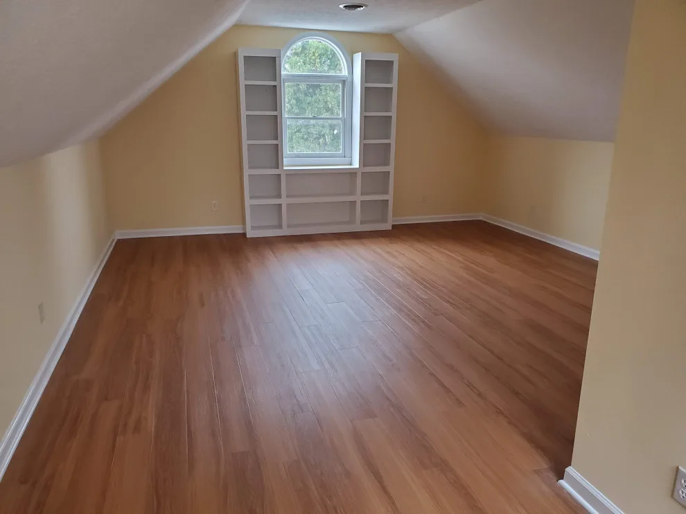 Barn bedroom apartment by BPS Southeast Flooring - Photo 2