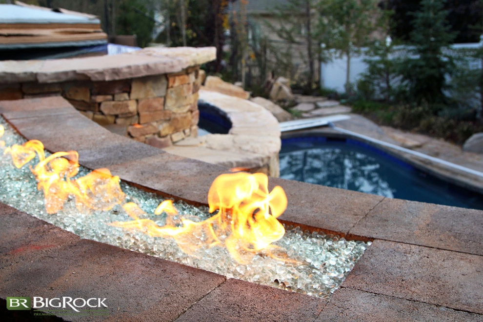 Rustic Pool With Hot Tub And Natural Landscaping by Big Rock Landscaping - Photo 2