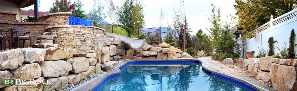 Rustic Pool With Hot Tub And Natural Landscaping by Big Rock Landscaping - Photo 12