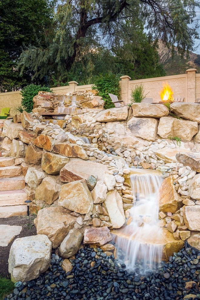 Waterfall In A Boulder Retaining Wall In Holladay Hills by Big Rock Landscaping - Photo 4