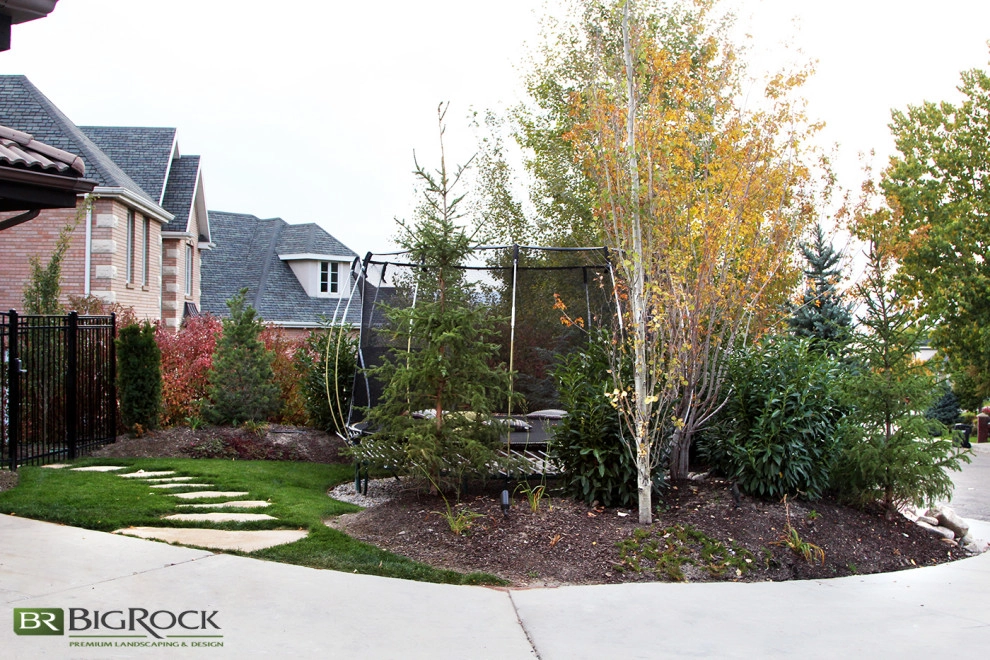 Rustic Pool With Hot Tub And Natural Landscaping by Big Rock Landscaping - Photo 4