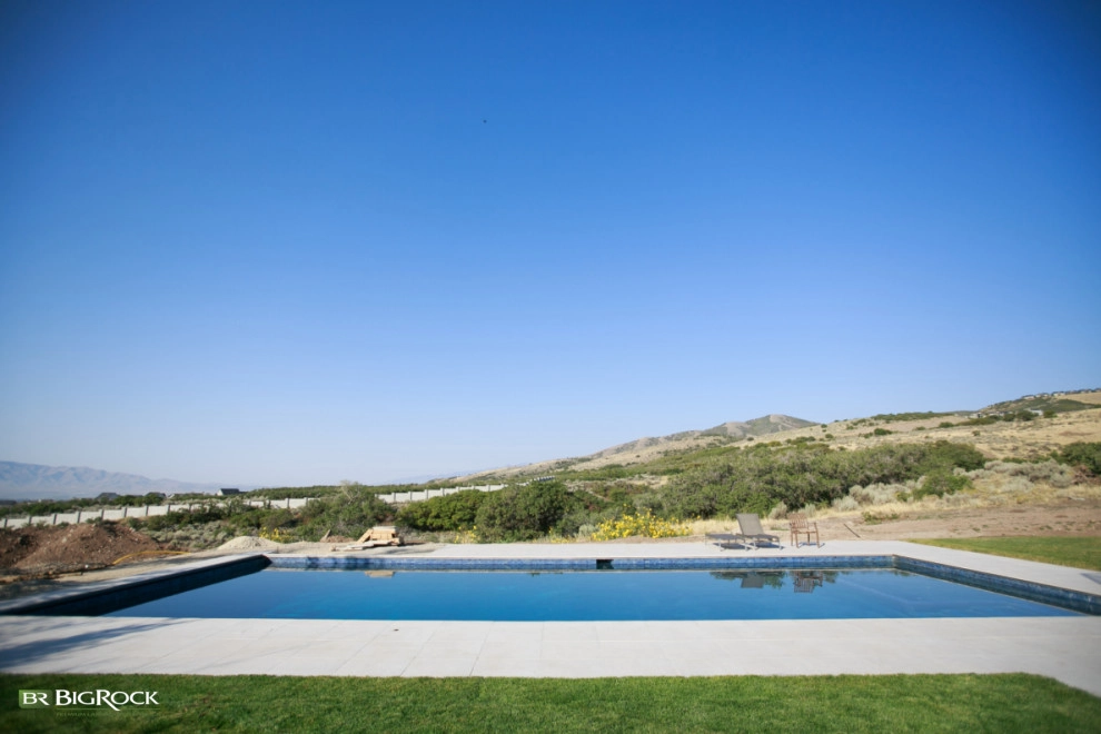 Contemporary Pool And Hardscape Along The Wasatch Front by Big Rock Landscaping - Photo 9
