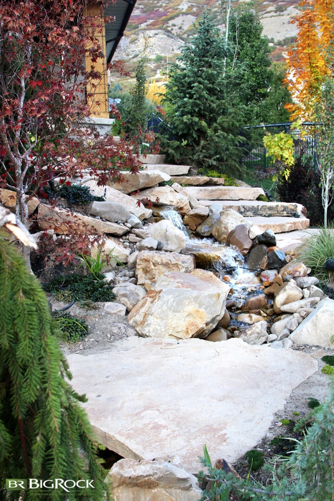Rustic Pool With Hot Tub And Natural Landscaping by Big Rock Landscaping - Photo 5