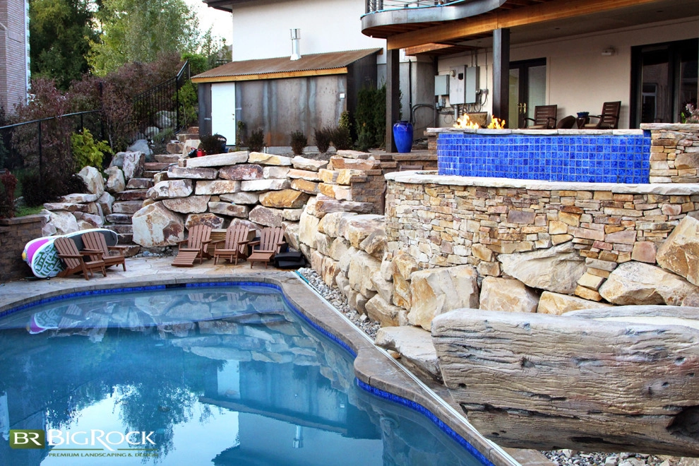Rustic Pool With Hot Tub And Natural Landscaping by Big Rock Landscaping - Photo 10
