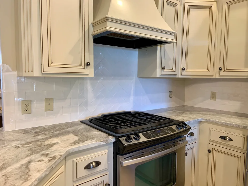 Kitchen Backsplash and Fireplace Trim by Benchmark Renovations - Photo 3