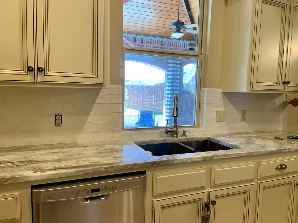 Kitchen Backsplash and Fireplace Trim by Benchmark Renovations - Photo 2