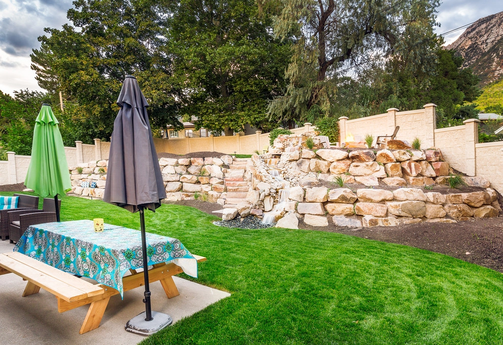 Waterfall In A Boulder Retaining Wall In Holladay Hills by Big Rock Landscaping - Photo 5