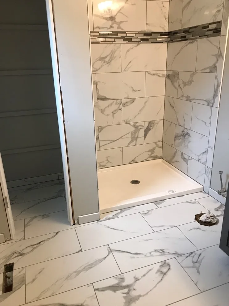 Installation of Marble Shower Tiles by Merkel Tile - Photo 3