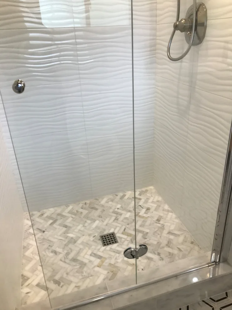 Contemporary Bathroom Renovation by Benchmark Renovations - Photo 11