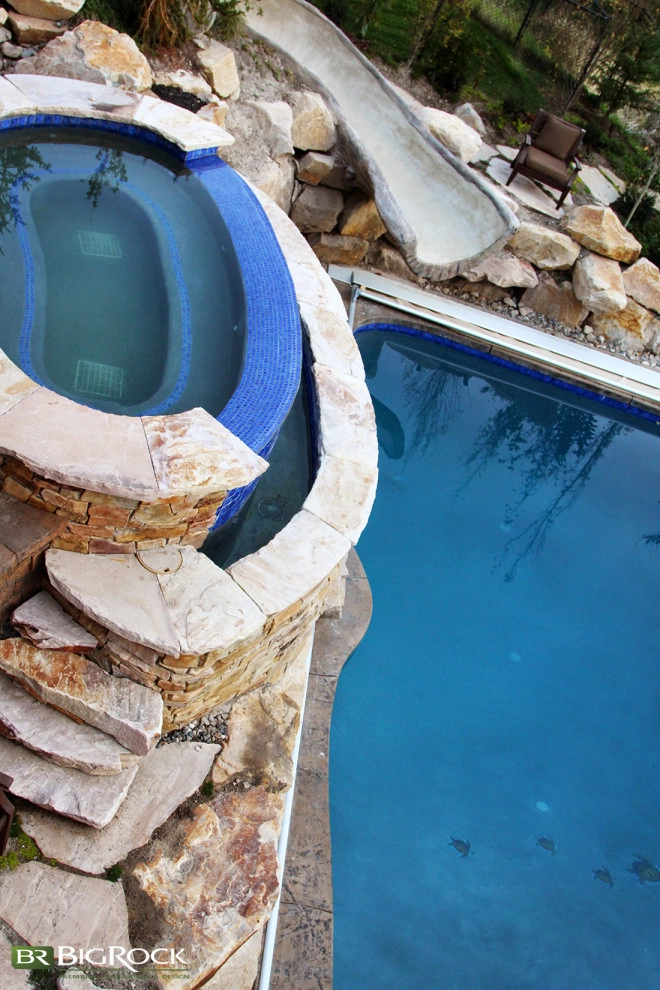Rustic Pool With Hot Tub And Natural Landscaping by Big Rock Landscaping - Photo 8