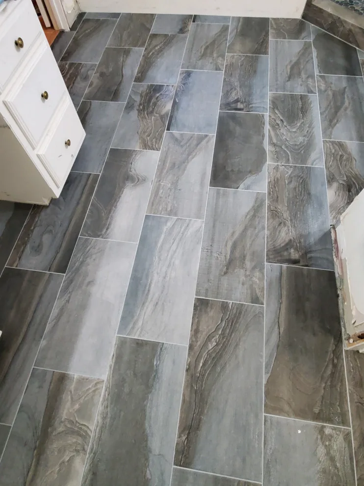 Updated Bathroom Tile by Footprints Floors | McKinney - Photo 4