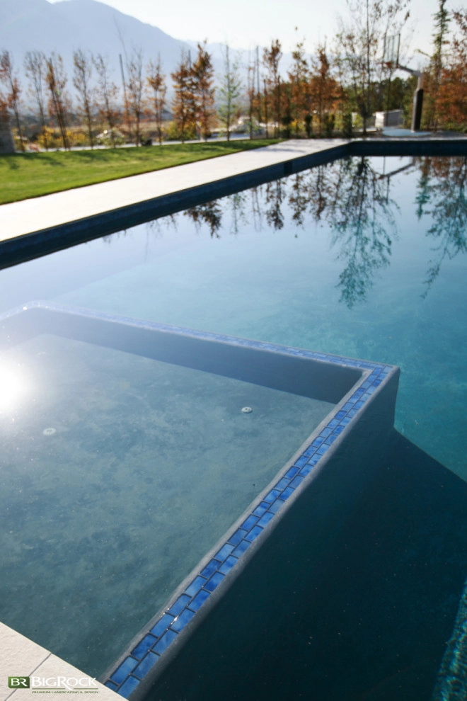 Contemporary Pool And Hardscape Along The Wasatch Front by Big Rock Landscaping - Photo 10