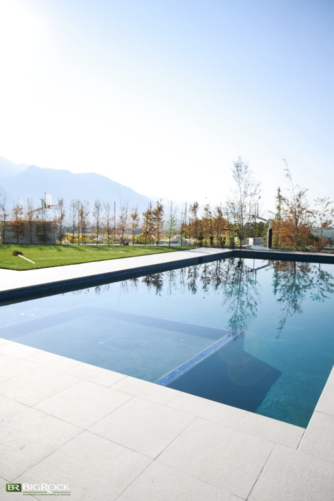 Contemporary Pool And Hardscape Along The Wasatch Front by Big Rock Landscaping - Photo 6