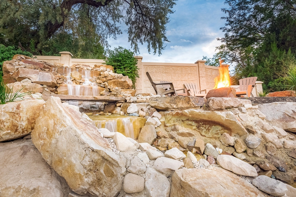 Waterfall In A Boulder Retaining Wall In Holladay Hills by Big Rock Landscaping - Photo 2