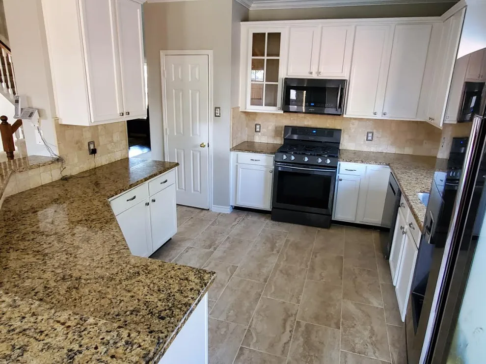 Large Tile Replacement and Fireplace Update by Footprints Floors | McKinney - Photo 2