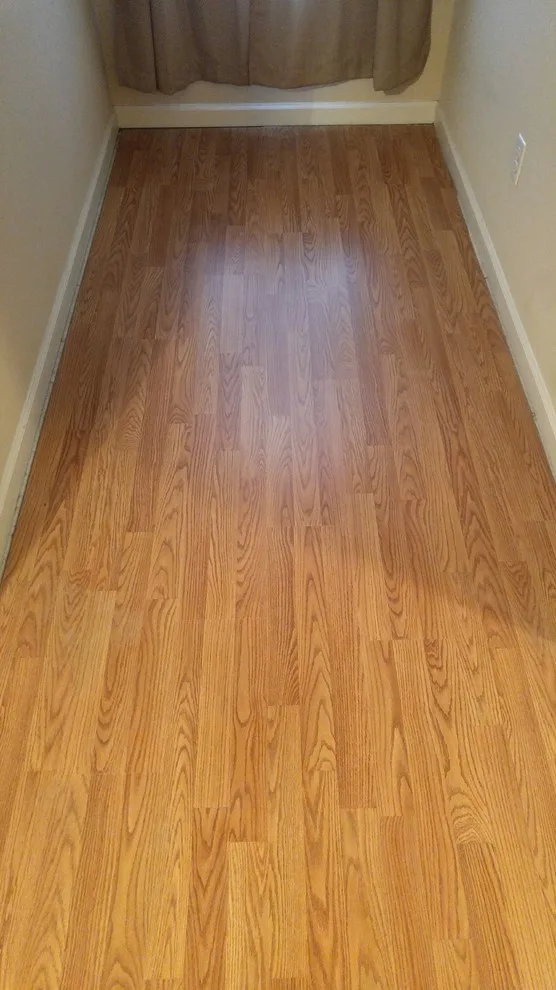 Two-Story Laminate Installation for Residents by Irvs Floor And More - Photo 9