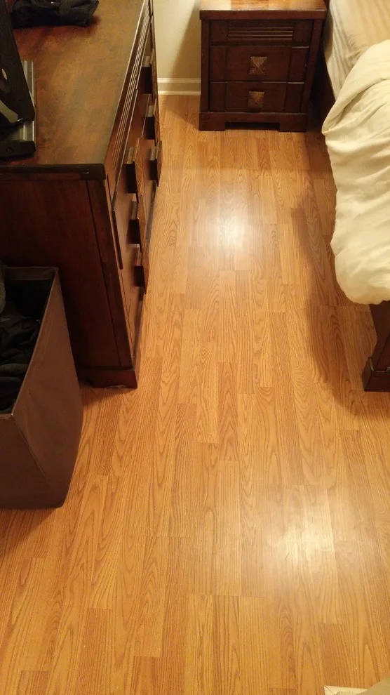 Two-Story Laminate Installation for Residents by Irvs Floor And More - Photo 27