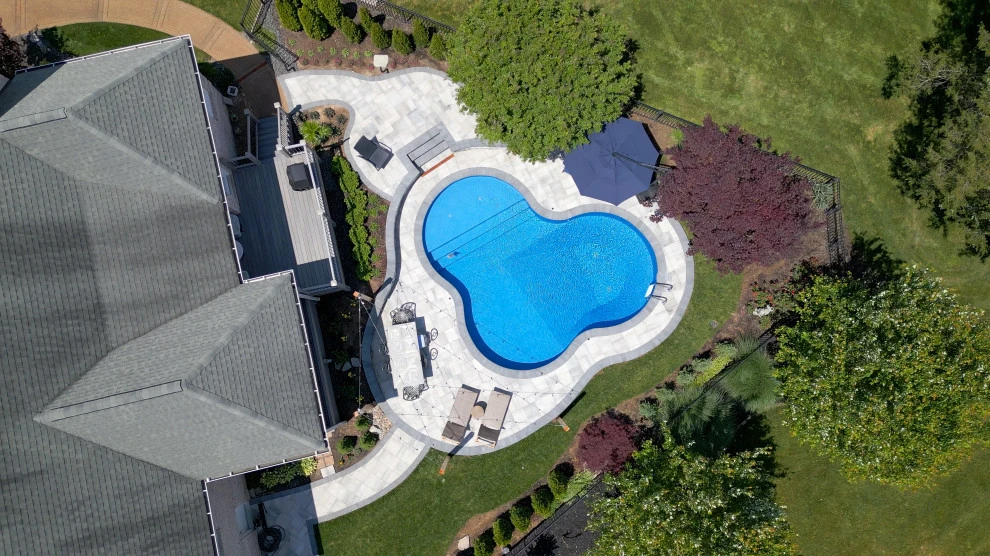 Pool Oasis with Hardscaping Features | Nashville, TN by Gardens Of Babylon Landscapes - Photo 9
