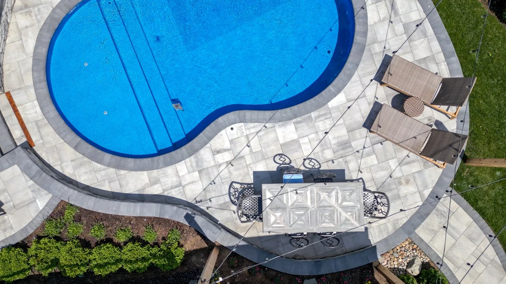Pool Oasis with Hardscaping Features | Nashville, TN by Gardens Of Babylon Landscapes - Photo 4