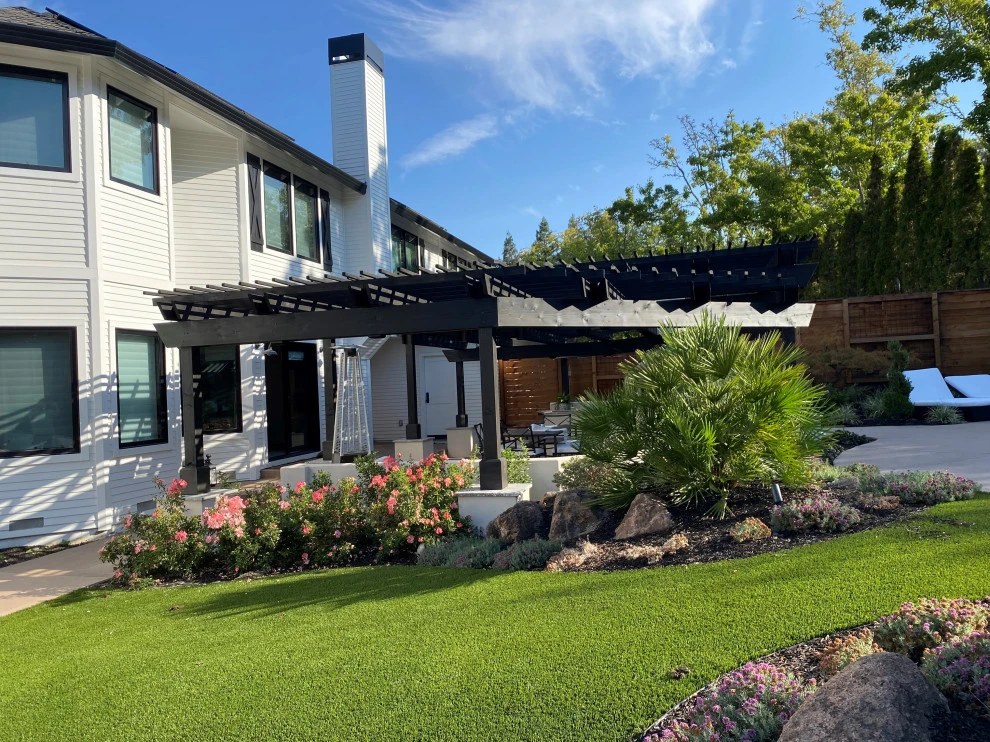 Farmhouse by Geared For Growing Landscape Services - Photo 4