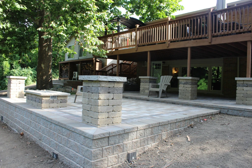 Paver Patio featuring built in grill by GLC Lawn & Landscaping LLC - Photo 11
