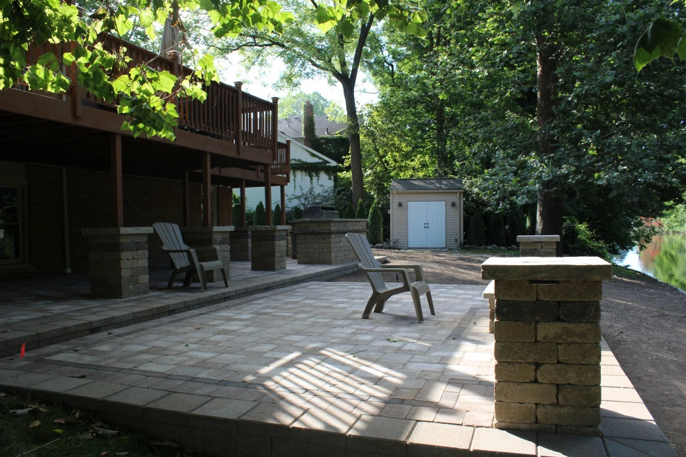 Paver Patio featuring built in grill by GLC Lawn & Landscaping LLC - Photo 9