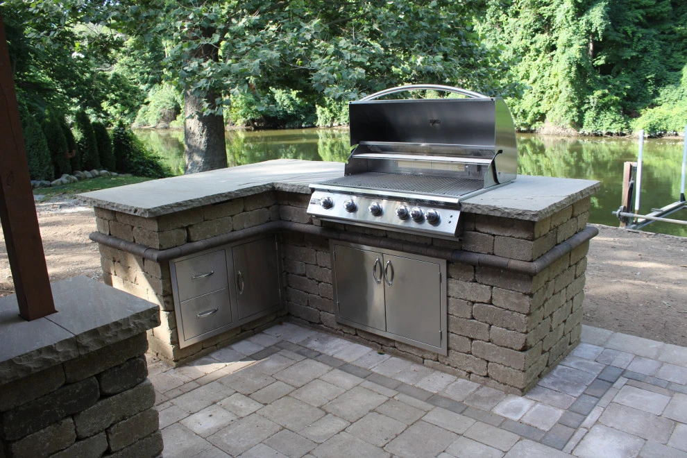 Paver Patio featuring built in grill by GLC Lawn & Landscaping LLC - Photo 4