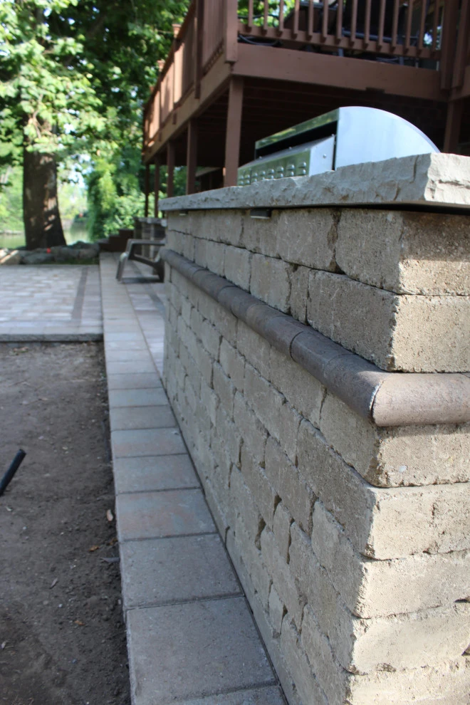 Paver Patio featuring built in grill by GLC Lawn & Landscaping LLC - Photo 7